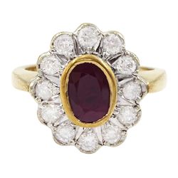 Gold oval cut ruby and round brilliant cut diamond cluster ring, hallmarked 9ct, ruby approx 1.00 carat, total diamond weight approx 0.60 carat