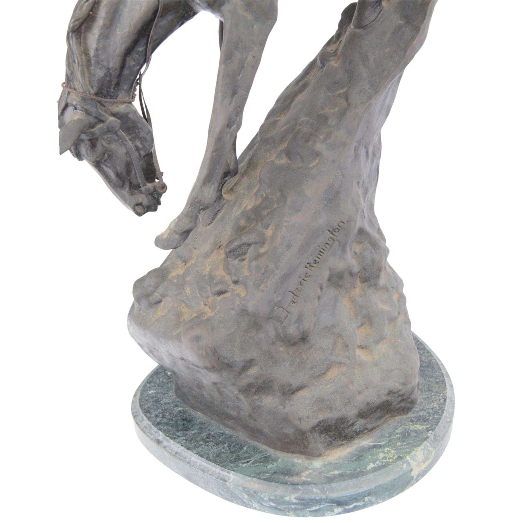 After Frederick Remington; The Mountain Man bronzed spelter figure of a native American trapper upon a marble base with plaque, H72cm