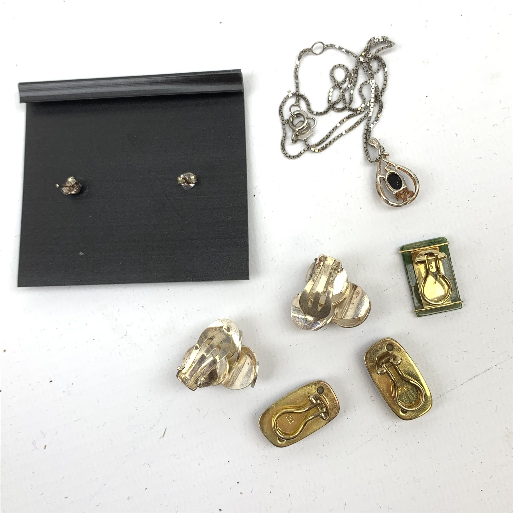 14ct gold jade earring, stamped 585, pair of silver contemporary design earrings, three other pairs of silver earrings and collection of costume jewellery including Aspinal handbag holder