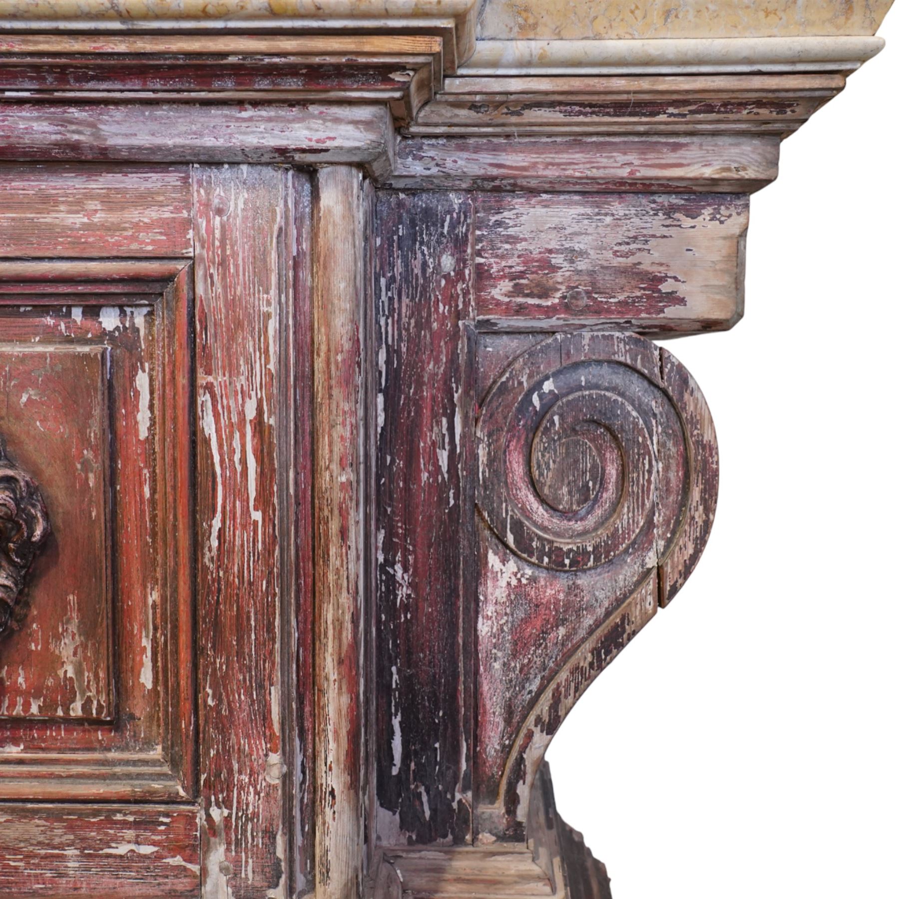 A 20th century Italian Neoclassical console table of monumental architectural form, inspired by Roman altar and sarcophagus prototypes; the rectangular marble top with dentil-moulded edge and polychrome geometric compass-star inlay, executed in contrasting marbles on a dark green ground, above a pedestal base of simulated stone finished in red porphyry-type tones, centred by a lion’s mask in relief and flanked by Ionic scroll volutes, raised on a stepped plinth base