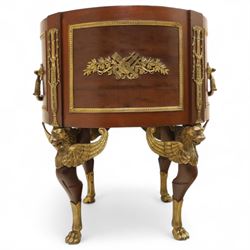An imposing and richly adorned Empire Revival jardiniere of circular form, decorated with finely cast gilt bronze laurel garlands and floral swags, interior with a modern brass liner, sides with gilt bronze carrying handles, raised on three tripod legs with classical caryatid masks with wings terminating in lion paw feet, circa 1900

Provenance: This jardiniere formed part of the original furnishings of the opulent Empire Room at Kinloch Castle, built by industrialist George Bullough in 1900.

An original inventory number, ‘X954’, is inscribed on one facing, verifying its presence in the Kinloch Castle collection. This jardiniere epitomises the lavish taste of the Edwardian elite and the high standards of craftsmanship employed in the furnishing of Kinloch Castle, the first private home in Scotland to be lit by electricity and famed for its extravagant interiors.


