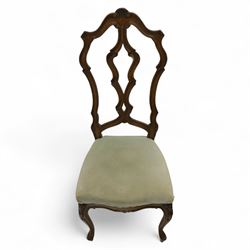 20th-century set of four French provincial-style stained beech dining chairs, pierced cartouche back with fan carving, with a scroll moulded frame above a padded serpentine seat on cabriole legs 