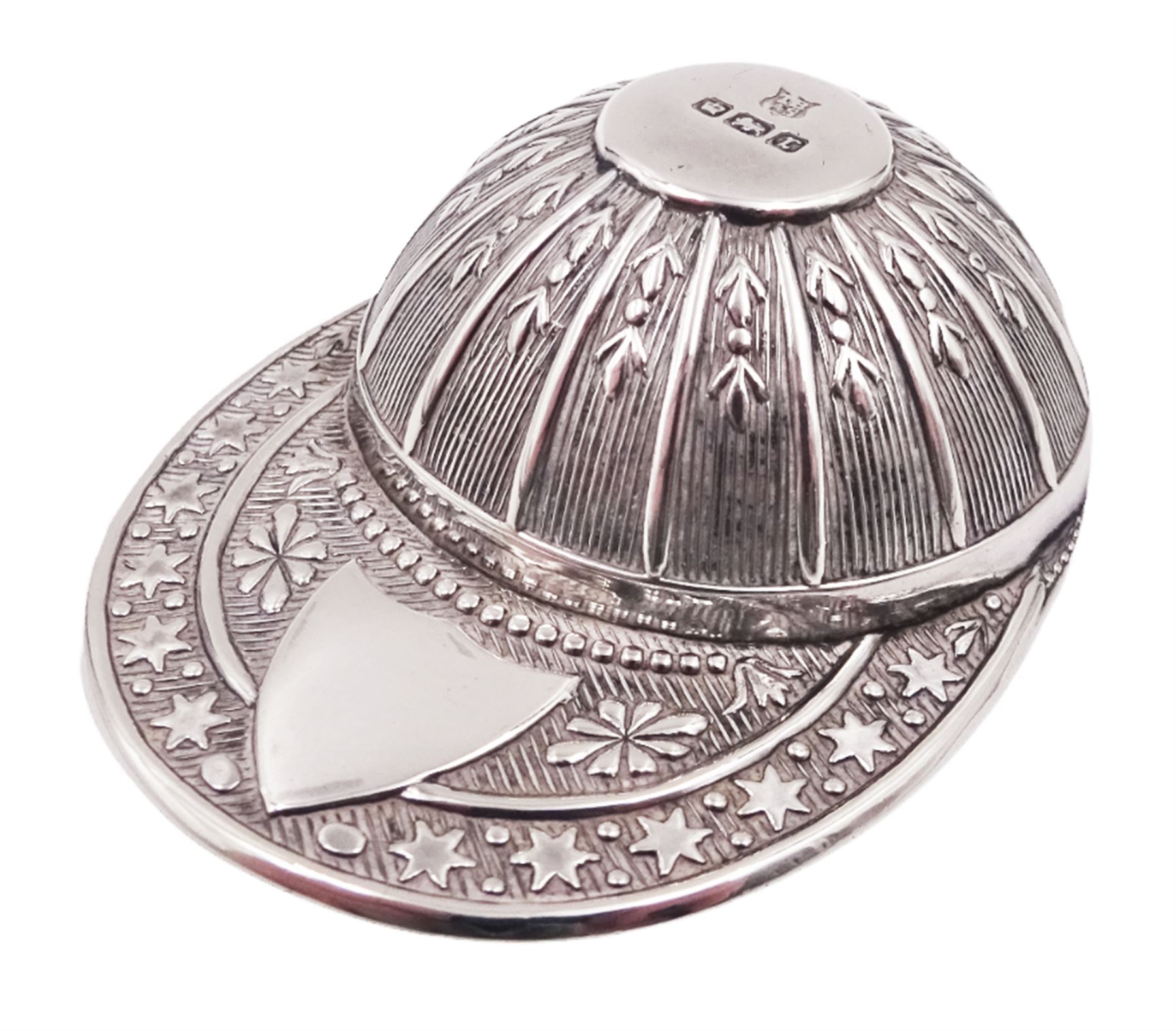 Edwardian silver caddy spoon, in the form of a jockeys cap, with embossed decoration and blank shield shaped cartouche, hallmarked Thomas Bradbury & Sons Ltd, Sheffield 1909, L5.3cm