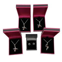 Silver jewellery, comprising three Baltic amber hummingbird pendant necklaces, a Baltic amber flamingo pendant necklace and a pair of cubic zirconia stud earrings, all stamped 925, boxed