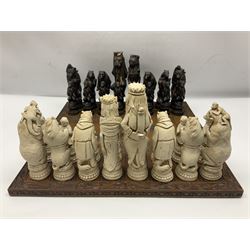 Chess set and resin chess pieces moulded as various animals, the pawns as monkeys, Kings as lions etc, board L46cm, W46cm, king H19cm