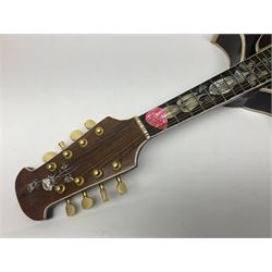 Eastern eight-string mandolin with sunburst finish and mother-of-pearl inlay L68.5cm; and another Harmony mandolin with cracked headstock (2)