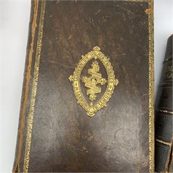 Victorian Peter Williams Welsh Bible 'Bibl Yr Addoliad Teuluaidd' with engraved plates. Folio. Full tree calf type binding with tooled gilt decoration; and another Victorian leather bound Peter Williams Welsh Family Bible with engraved and colour plates and brass clasps (2)