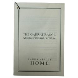 Laura Ashley - contemporary oak tall chest of drawers from the Garrat range, honeycomb rectangular top featuring central groove, over four small drawers with brass knob pulls and four long drawers with drop handles, on plinth base