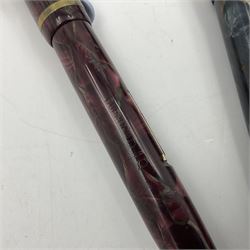 Six Burnham marbleised fountain pens, four with 14ct gold nibs