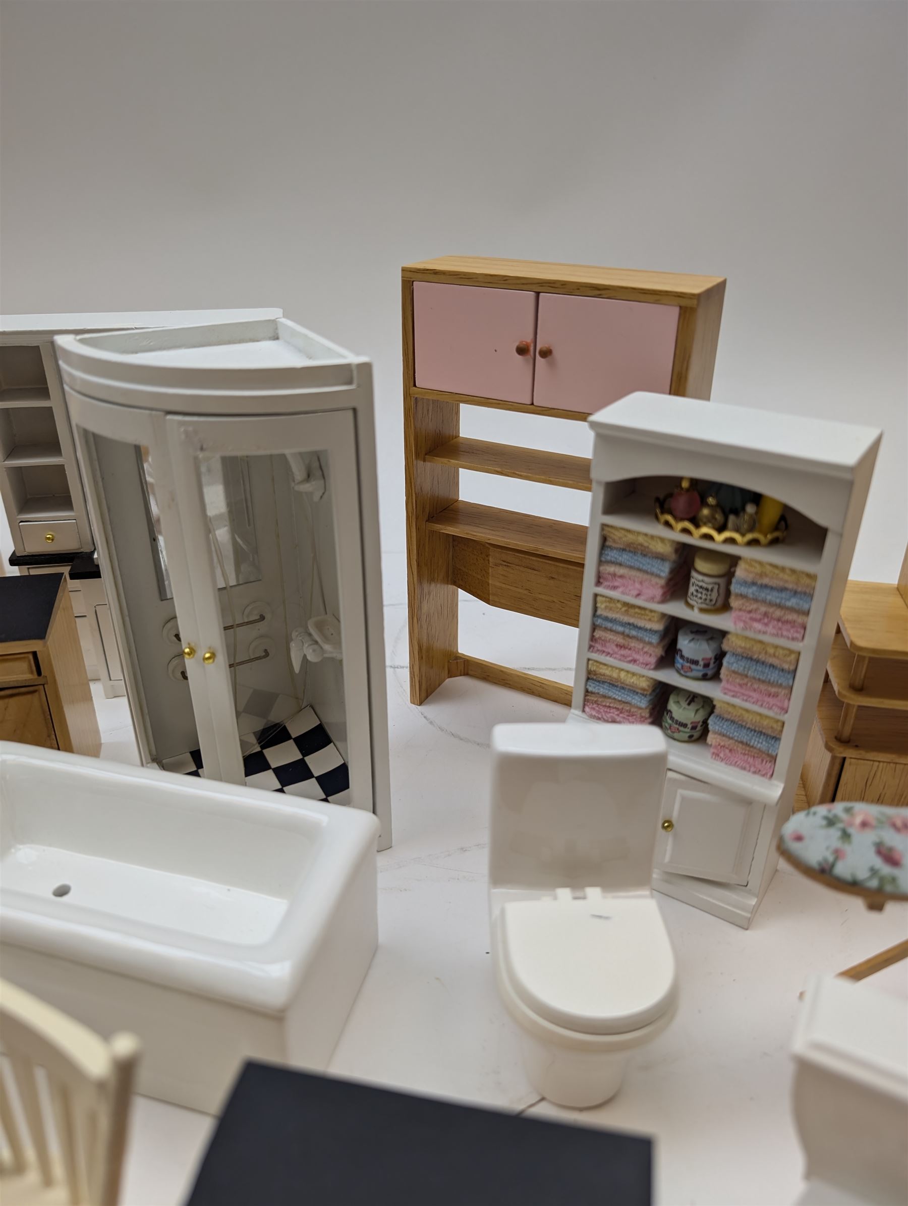 Modern 1:12 scale dolls house furniture, comprising pine kitchen set, with wall cabinets, floor cabinets and sink unit, white wooden bathroom suite, white wooden kitchen and dining room furniture and appliances, wooden bedroom furniture, Raine purple wingback chair, tv, desk, fish tank, etc