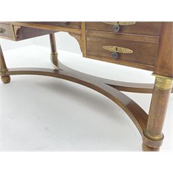 French Empire style walnut desk, moulded rectangular top with inset leather, two leather inset slides either side, fitted with four drawers, turned supports joined by curved x-shaped stretchers, gilt metal mounts 