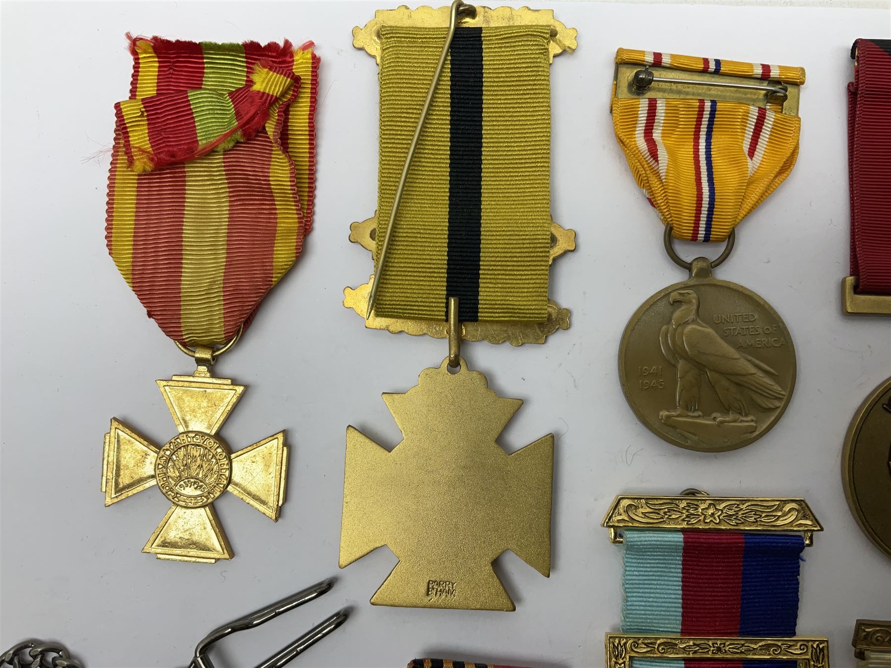 RAOB jewel Bourn Lodge 9394 with 25 years bar; two masonic jewels and triangular pendant watch; British Iron Cross style propaganda medallion; French Legion of Honour and Combatants Cross; and three foreign medals