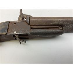 19th century Belgian 9mm side-by-side double barrel pin-fire pocket pistol with 11cm octagonal single block barrel, drop-down triggers and carved walnut stock L22.5cm overall
