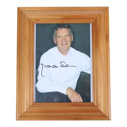 Collection of Michael Palin books, to include 'Travelling to Work - Diaries 1988-98' 'Hemingway Adventure' and 'Pole to Pole'; together with signed photo and 'Monty Python's Life of Brian' DVD 