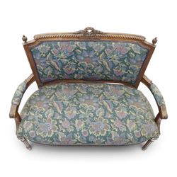 20th century French Louis XVI style stained beech two-seat salon settee, rectangular upholstered back and seat in floral tapestry fabric, carved and moulded frame with foliate cresting, padded open arms and fluted tapering supports