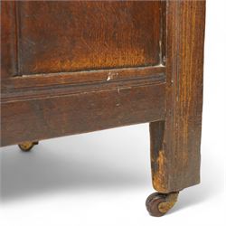 18th century oak blanket box, moulded rectangular hinged lid over lunette carved frieze rail and panelled front, moulded frame and panelled sides fitted with carrying handles, on stile supports