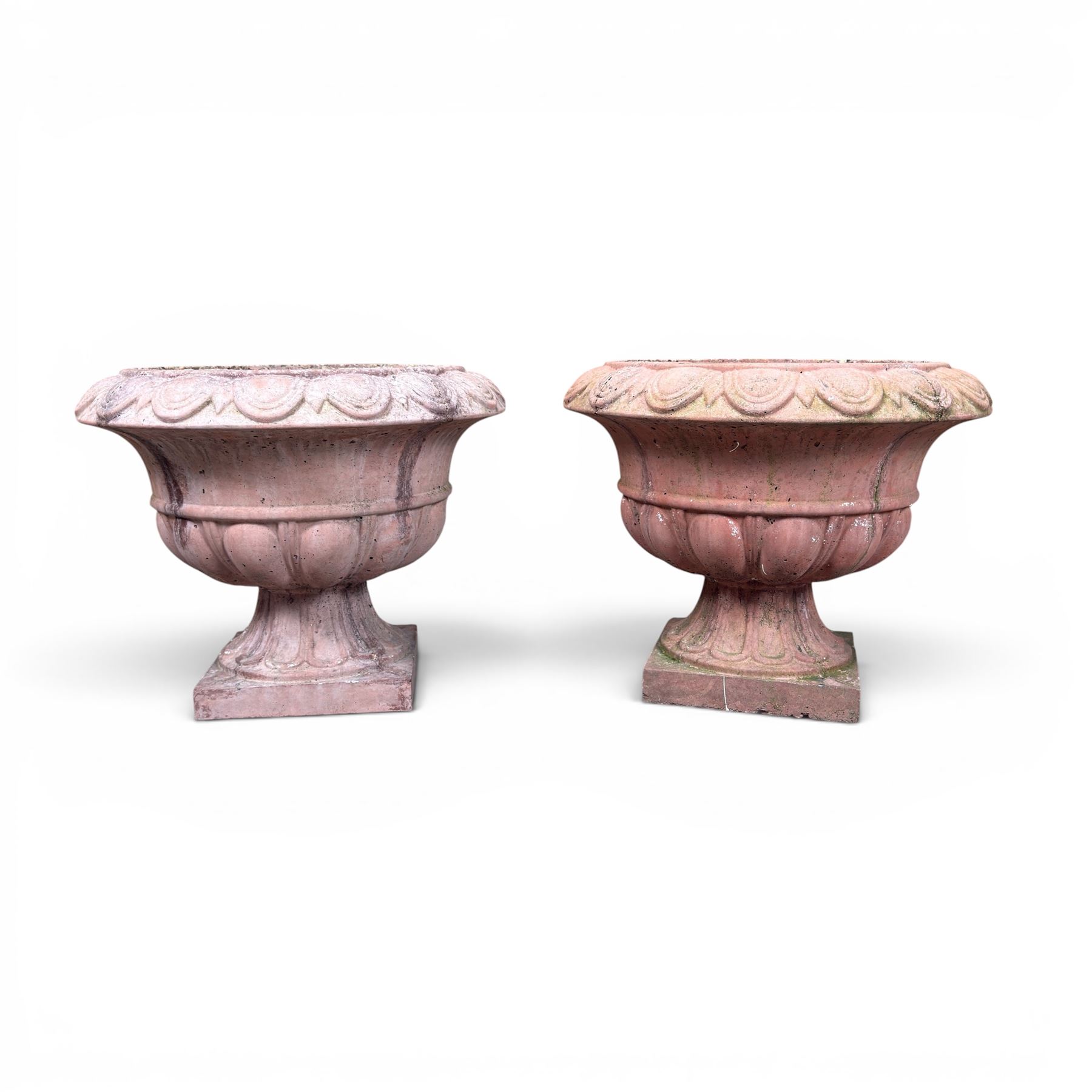 Pair of cast stone stone circular squat planters, egg and dart detail to rim, square base