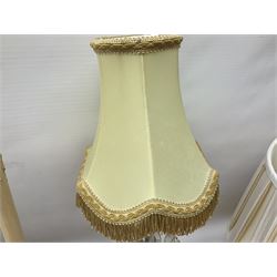 Quantity of table lamps to include pair of pink and gilt glass examples with pink pleated fabric shades, moulded glass example with drops, and larger lamp modelled with two faux candlesticks and cream pleated fabric shade, etc, largest H62cm