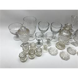 A group of 19th century and later glassware, to include a pair of cut glass open salts of navette or boat form, possibly Irish, two cut glass sweetmeat jars and covers, a further cut glass jar and cover, various early 19th century style drinking glasses, etc. 