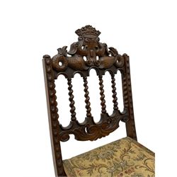 19th century carved mahogany folding chair, cresting rail carved with two stylised fish flanking a crown, spiral turned spindle supports over tapestry seat (W37cm H89); and another folding chair (W46cm H100cm)