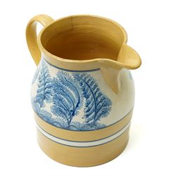 Late 19th century mocha ware jug, the yellow ground with cream and blue bands, and with typically decorated collar H18.5cm  