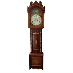 A Scottish longcase clock c 1890 in a contrasting light and dark mahogany veneered case, hood with a carved and crested pediment with a break arch door flanked by inlaid parquetry work, with a short trunk door and applied cushion mouldings, door flanked by half-turned applied columns on a square pediment with a recessed panel, fully painted break arch dial with spandrels representing the united kingdoms of Scotland, England, Ireland and Wales with a depiction of Robert Bruce to the arch, dial with Roman numerals ,minute track, subsidiary calendar dial and seconds dial with matching stamped brass hands, dial inscribed “J Cuthill, Beeth”, with an eight day striking movement,  striking the hours on a cast bell. With pendulum and two flat weights. 
John Cuthill is recorded as working as a watchmaker and clockmaker at 36 Eglington Street, Beith, Ayrshire. 1893.  
