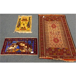  Baluch black ground rug, repeating border (180cm x 110cm) and two other prayer rugs (3)  
