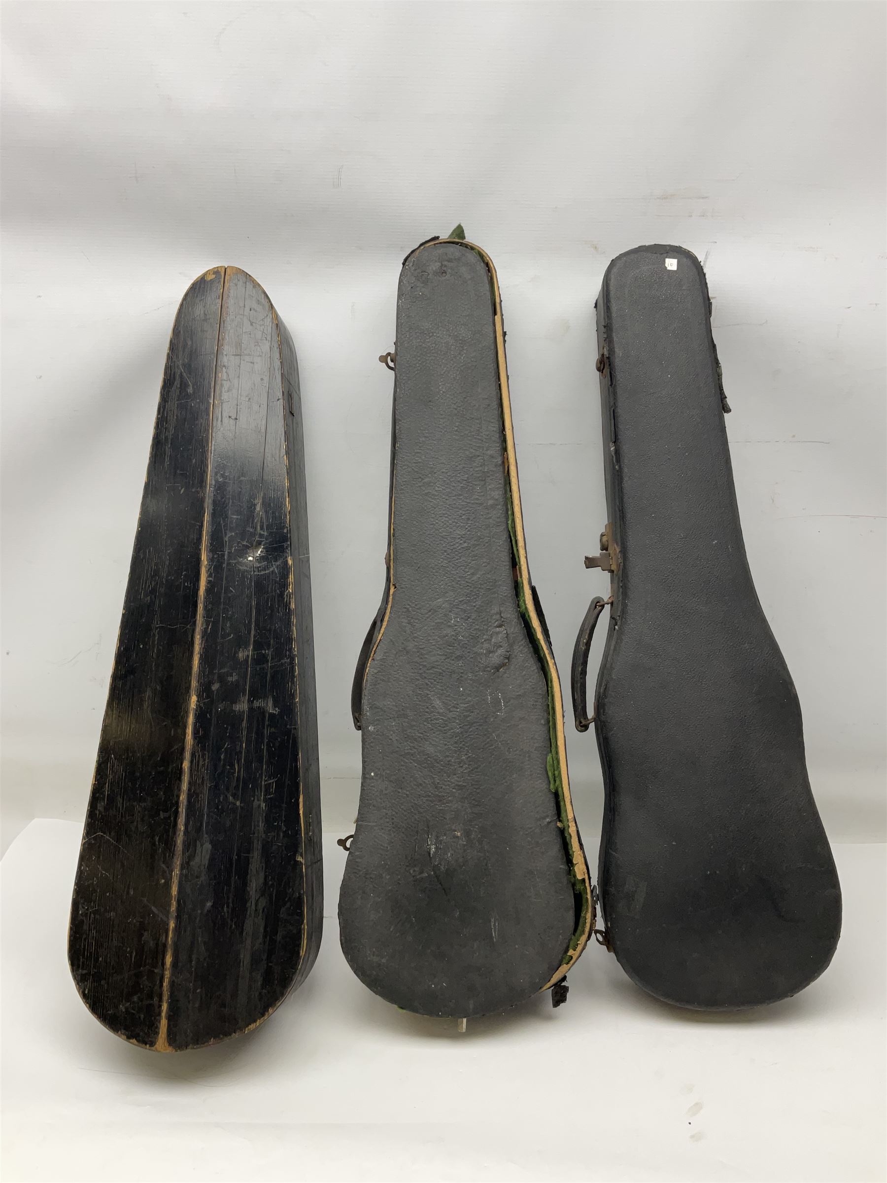 Czechoslovakian violin c1920 with 36cm two-piece maple back and ribs and spruce top, bears label 'Copy of Antonius Stradivarius Made in Czechoslovakia' L59cm; in carrying case; 1950s Czechoslovakian violin; and 195os Czechoslovakian three-quarter size violin; both cased (3)