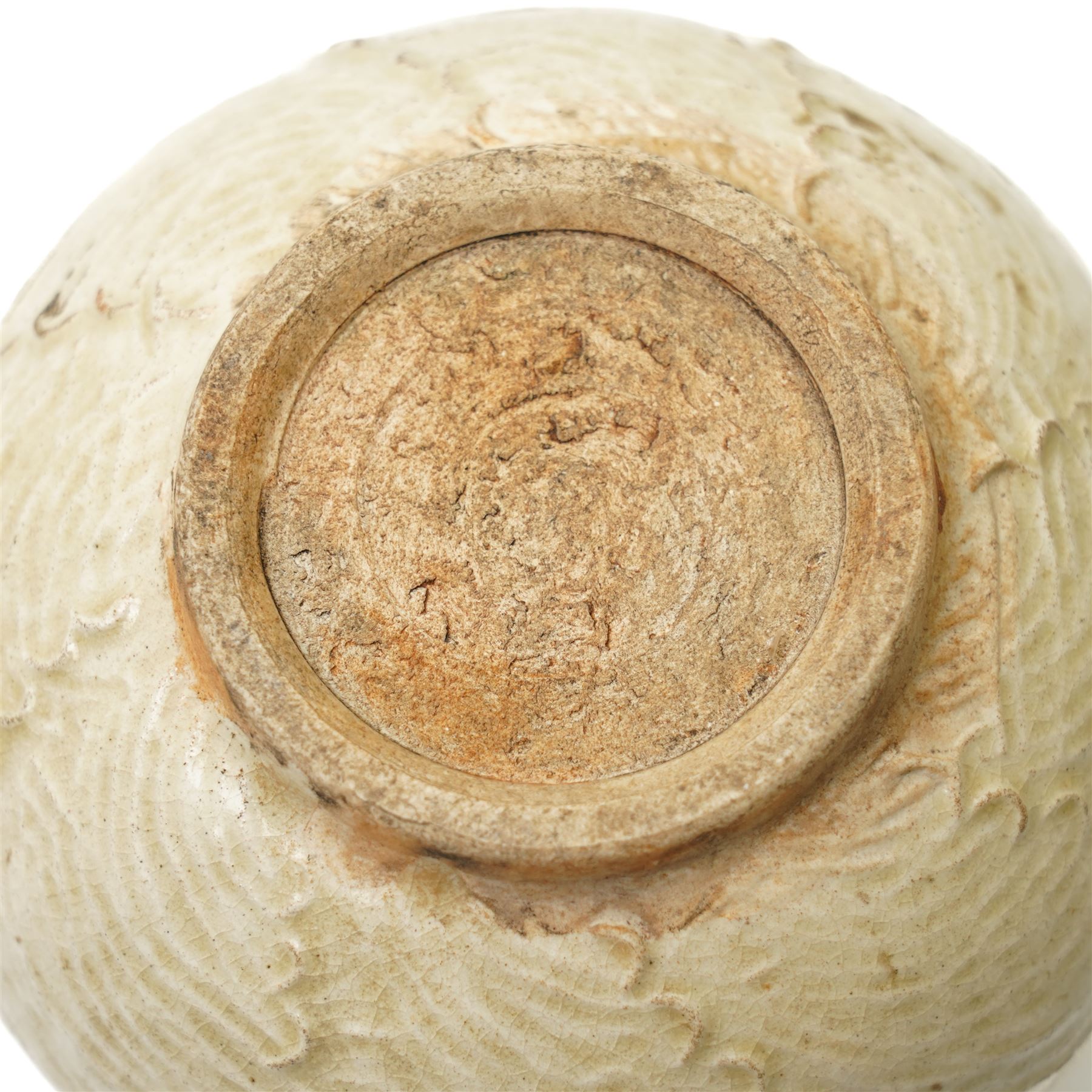 Chinese celadon glazed jar, possibly Ming dynasty, with moulded repeating decoration, 9.5cm