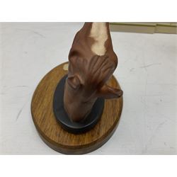 Beswick set of horse head wall plaques 'Champions all', comprising Arkle no.2700, The Minstrel no.2701, Red Rum no.2702, Troy no.2699, all with original boxes