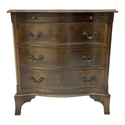 Georgian design mahogany serpentine bachelor's chest, fitted with slide over three drawers, on bracket feet
