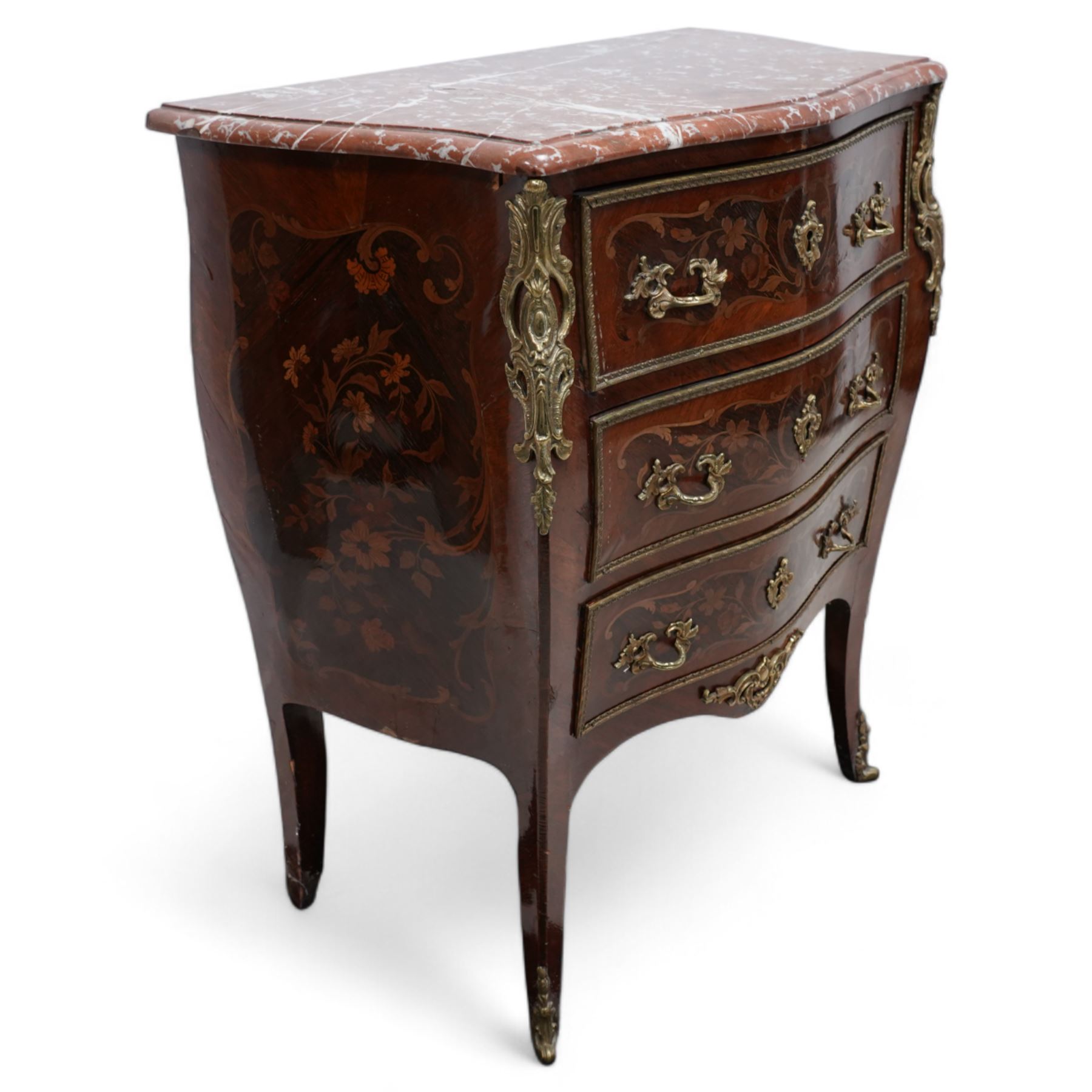 Early 20th century French walnut and rosewood marquetry bombe chest, shaped marble top over three drawers, each with gilt-metal cock-beading and handles, inlaid with overall floral decoration, flanked by gilt metal scrolling cartouche mounts and matching apron, on splayed supports