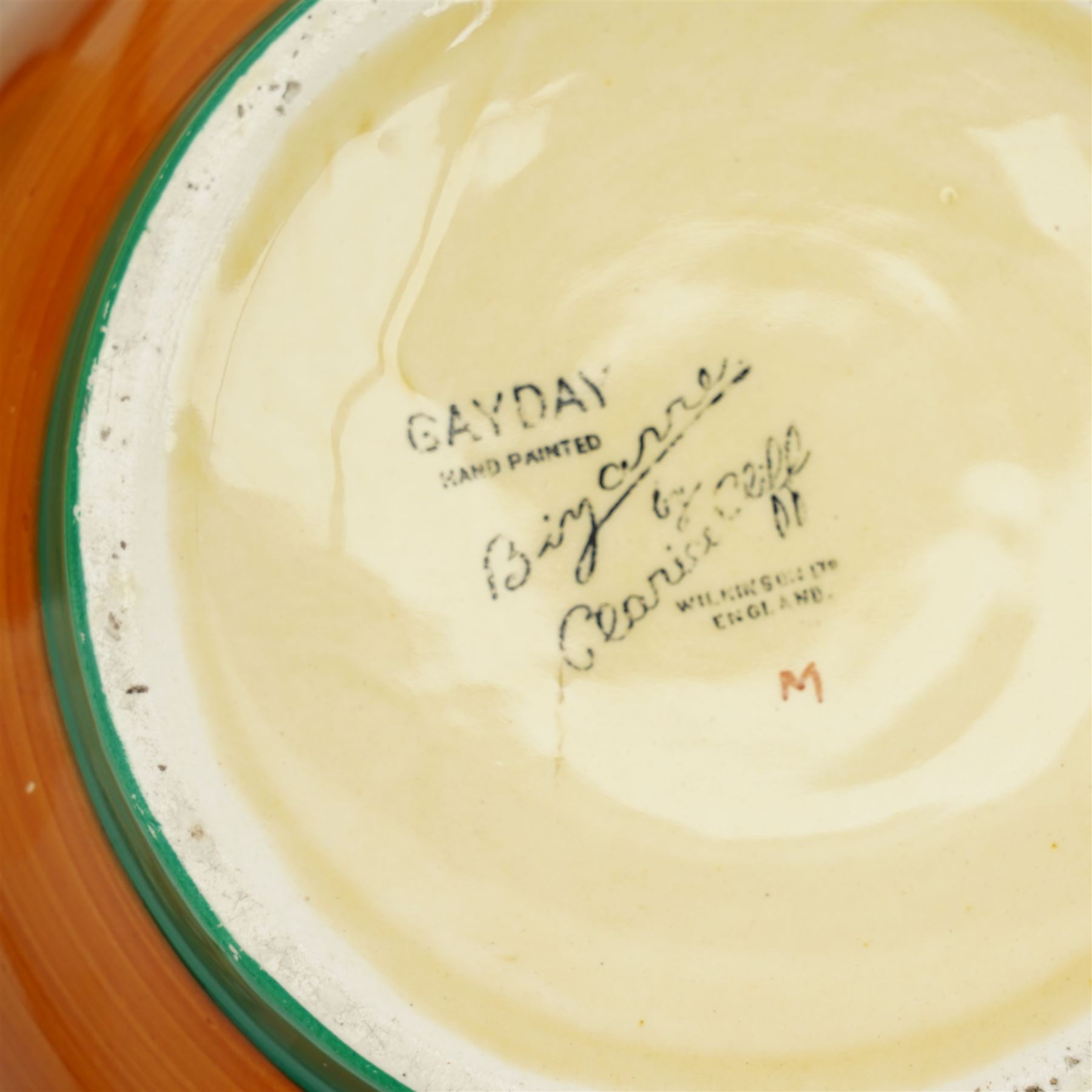 Clarice Cliff Bizarre 'Gayday' pattern bowl, D18cm; and rare 'Applique' pattern biscuit barrel, c1930, decorated with an orange tree and a caravan beside a river, H13cm, each with printed marks to base (2)