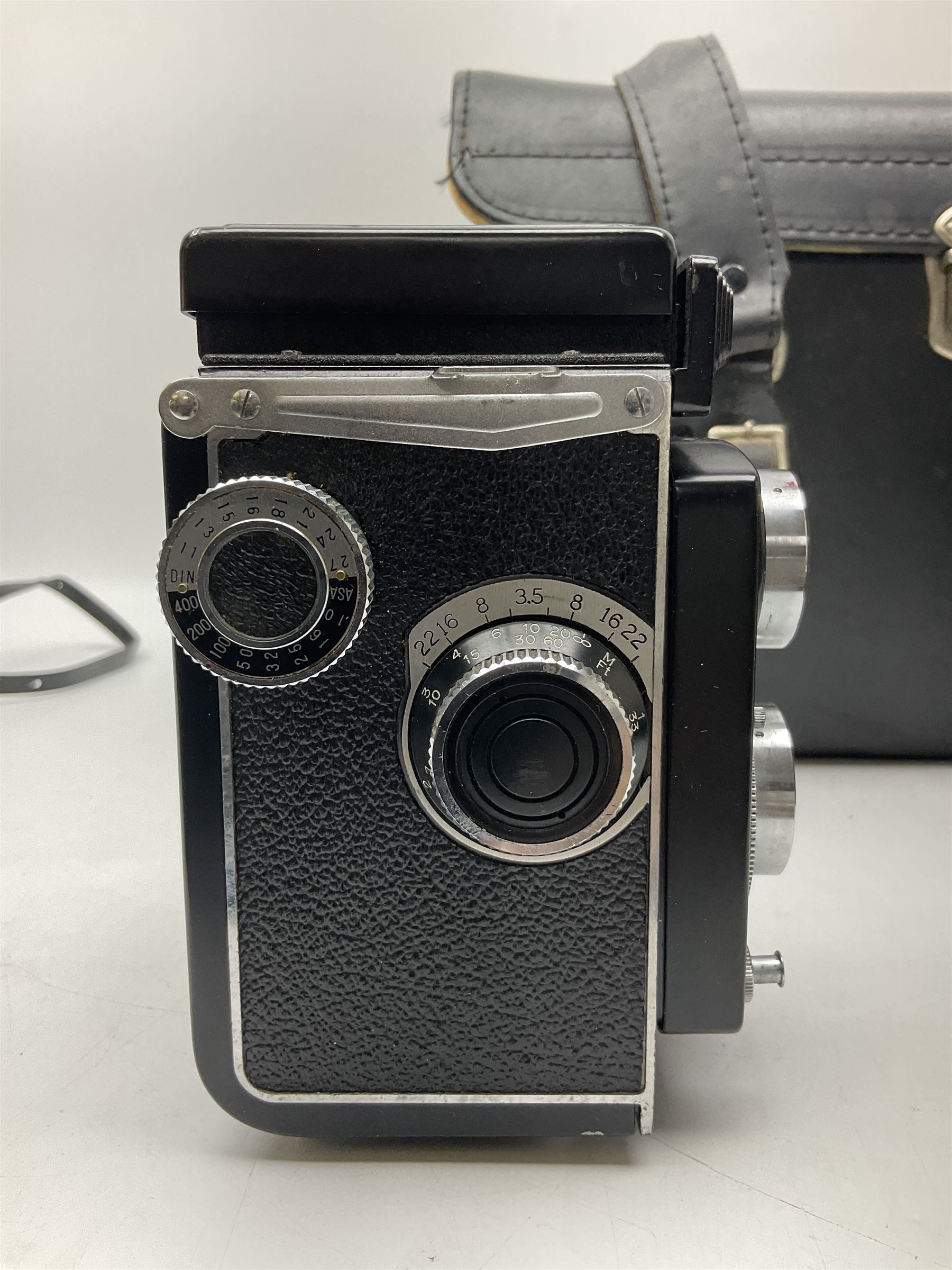 Yashica-A camera body, serial no. A4080073, with 'Yashikor 1:3.5 f=80mm' lens, serial no. 209272 and 'Yashikor 1:3.5f=80mm' lens, serial no 22942, together with Yashica TL-Electro camera body, serial no. 5054162 with 'Yashinon-DS 50mm 1:1.9  40056038