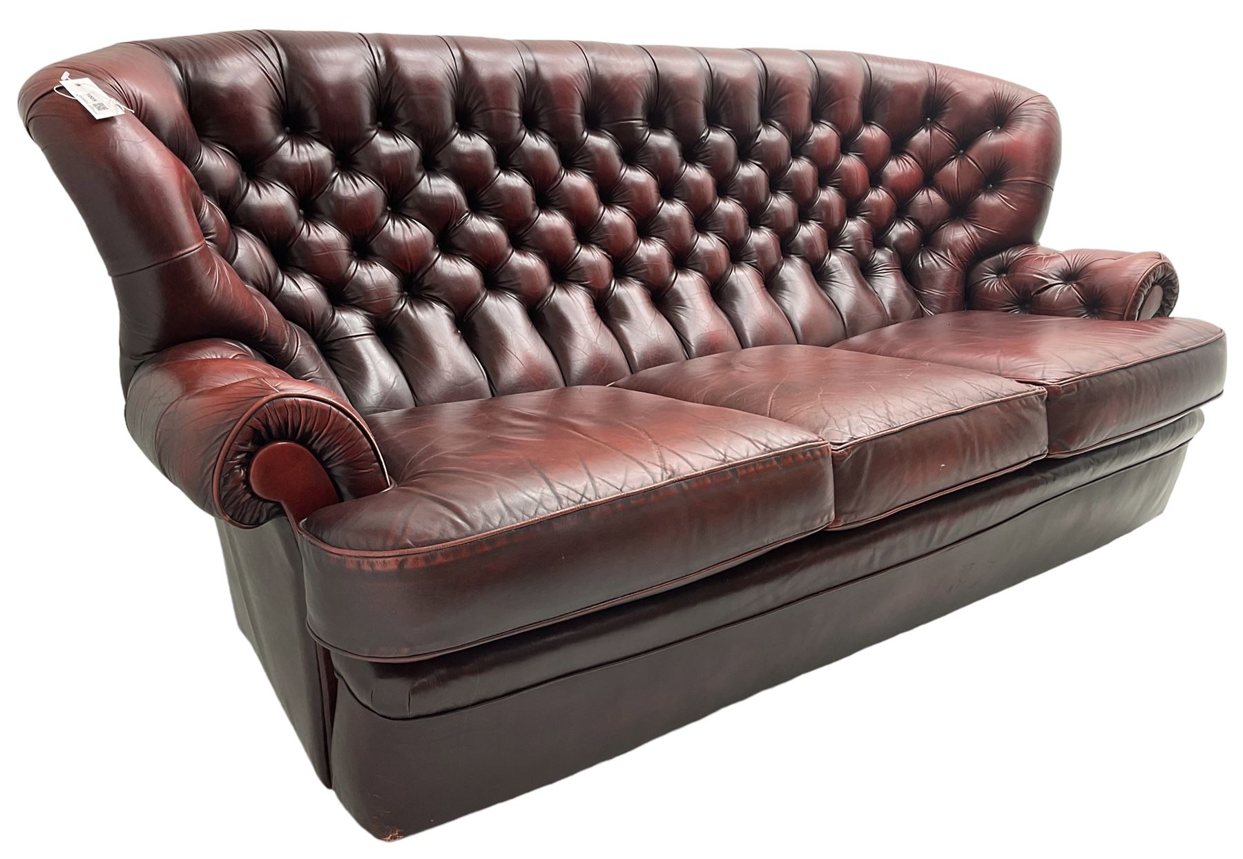 Wade - Georgian design three-seat sofa, high curved back over scrolled arms, upholstered in deep buttoned oxblood 'Pegasus' leather, on castors