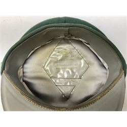 Five reproduction German WW2 hats comprising Wehrmacht olive tropical helmet, Heer officer's peaked cap, two M43 caps and Field side cap (5)