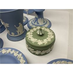 Large collection of Wedgwood Jasperware, including large vase, two pairs of candlesticks, covered sucrier etc 