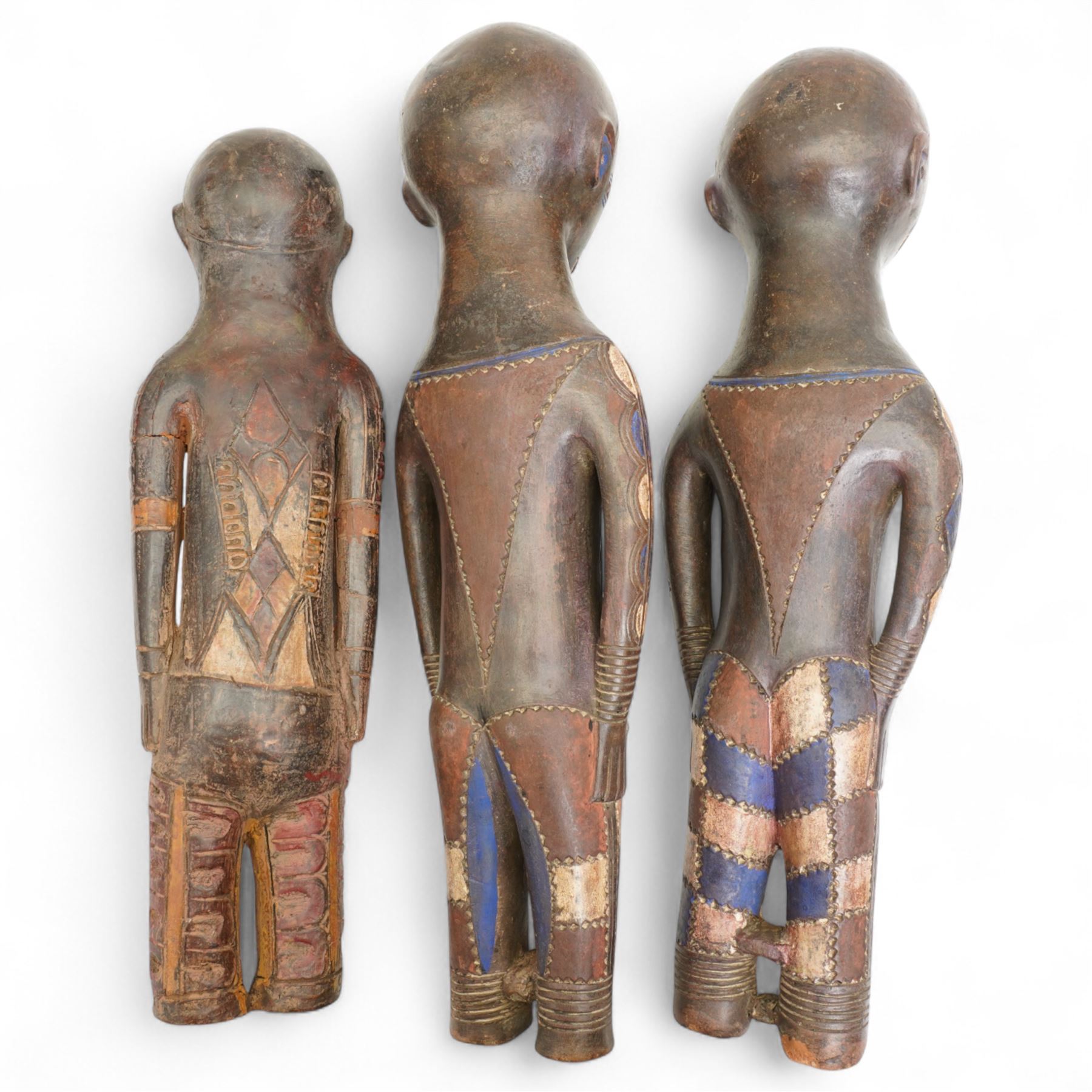  Family group of three terracotta Kouyou figures, Democratic Republic of the Congo representing father, mother and child, tallest 57cm