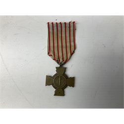 Five continental medals - WW1 Belgian Cross of Fire; WW1 French Croix De Guerre; French Croix De Combattant; French Republic Workers silver merit awarded to L. Mounet 1950; and boxed French Palmes Universitaires Officier d'Academie silver and enamel wreath (5)