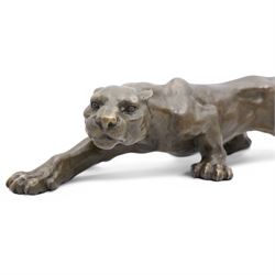 Bronze figure, modelled as a cougar or panther in crouching pose, signed Milo and also bearing foundry mark, L40cm