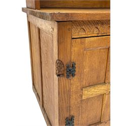 Gnomeman - adzed oak dresser, arcade carved cresting rail over two lead glazed doors, double cupboard below enclosed by two panelled doors, carved with gnome signature, by Thomas Whittaker, Little Beck 