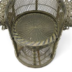 Mid-20th century wicker and rattan Peacock chair in unusual tones of dark olive and black, high fan back with a pieced and woven frame terminating to scrolled arms, with loose seat cushion