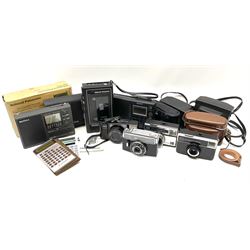 Commodore LC63SR scientific calculator in case; Casio HS-8LU solar powered calculator; National Panasonic RQ-331 Mini Cassette Recorder, boxed; two portable radios by Sony and Matsui; and four cameras by Agfa, Olympus and Kodak