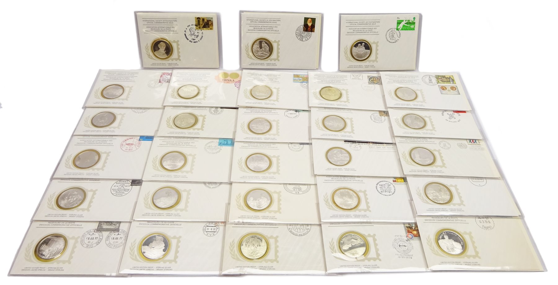 Twenty-eight sterling silver proof medallic first day covers, 'In Commemoration of the 400th Anniversary of the Birth of Peter Paul Rubens', each medallion, minted by the Franklin Mint, is housed within an 'International Society of Postmasters Official Commemorative Issue' cover, with accompanying certificate (28)

[image code: 7mc]