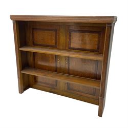 Early 19th century and later plate rack or bookcase, the back made from two early 19th century oak and mahogany press doors