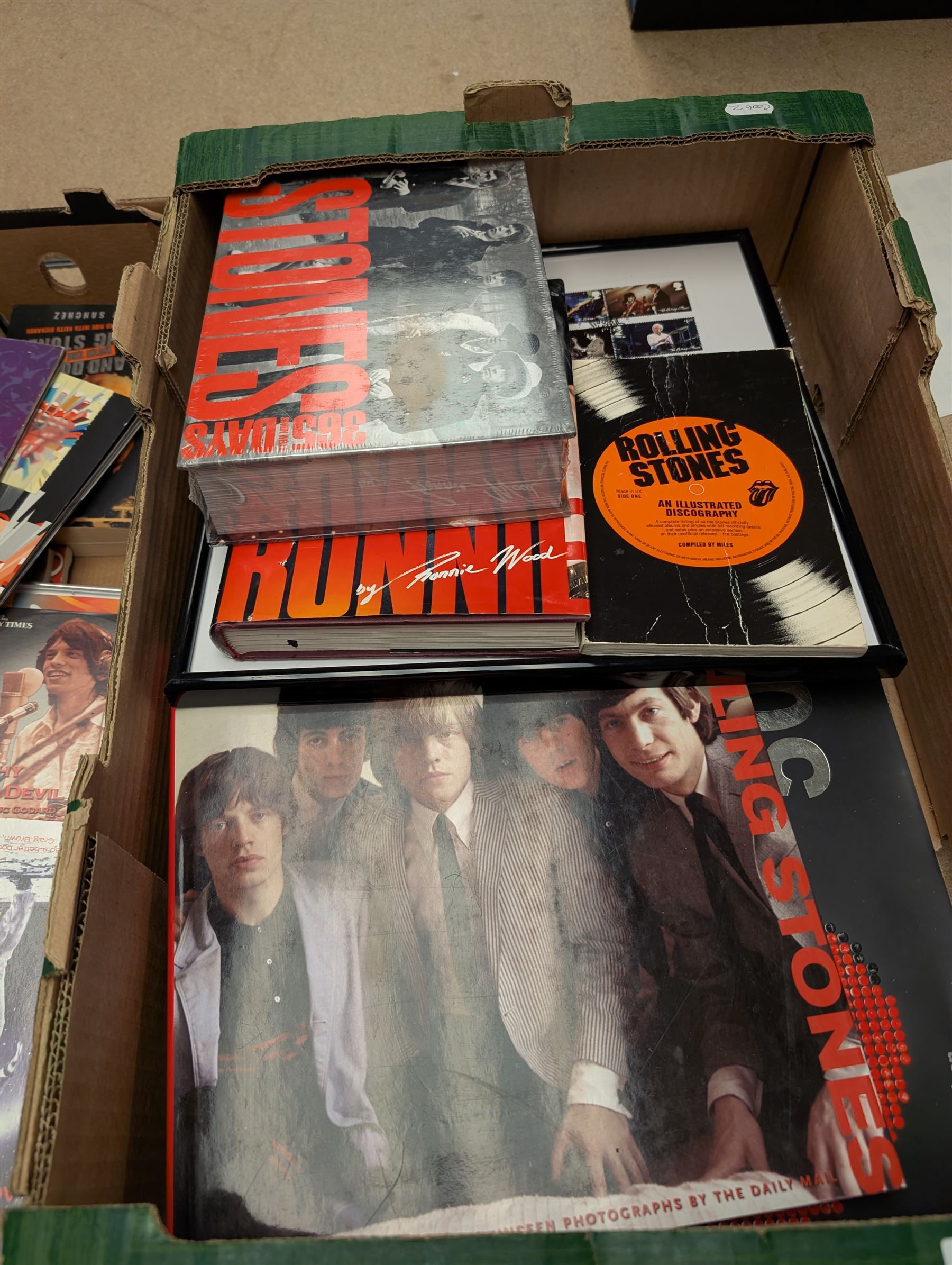 Rolling Stones memorabilia, including posters, CDs, books and tour programme, with a framed Rolling Stones first day cover