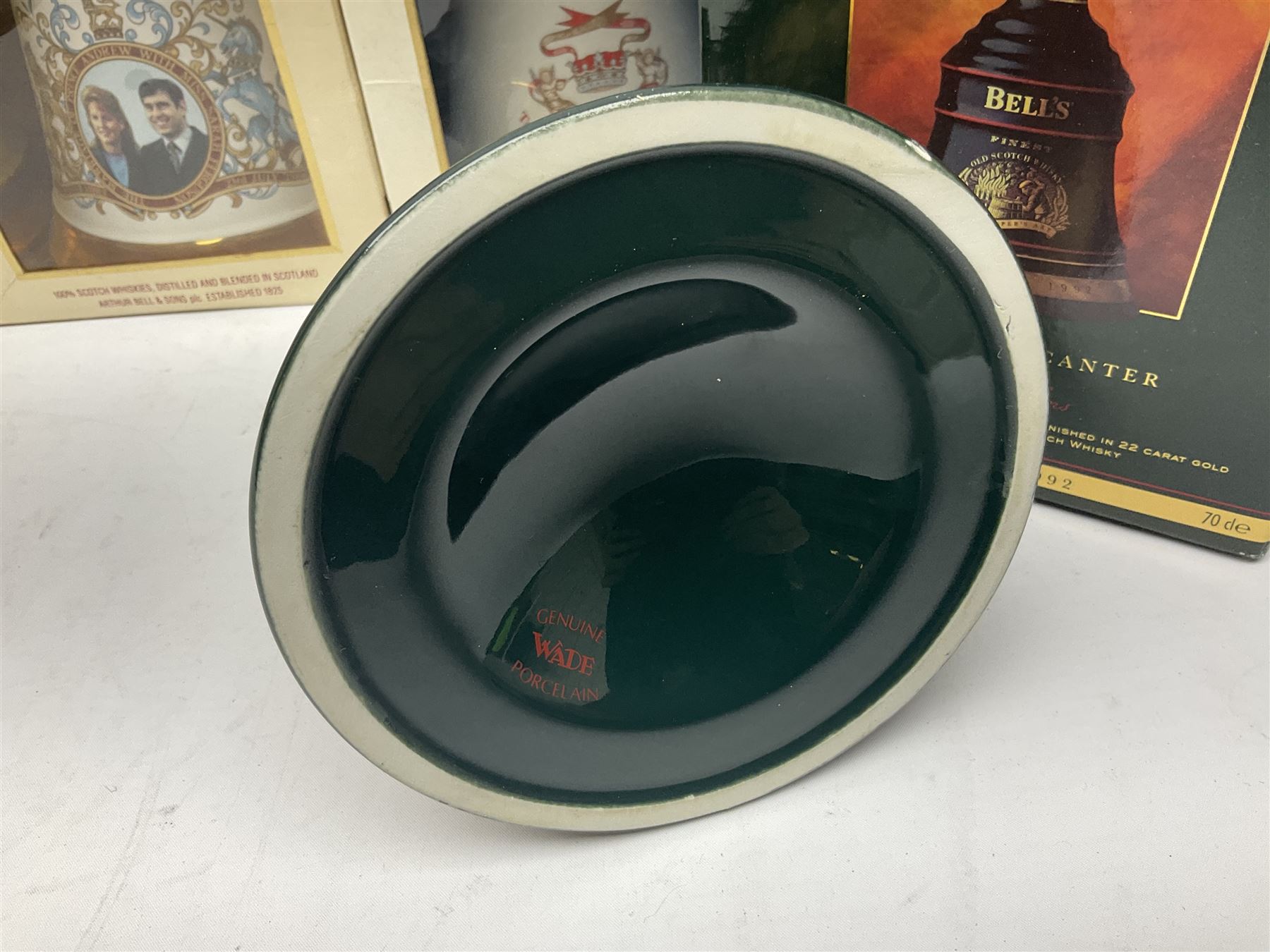 Bells, Scotch whisky, in eight Wade ceramic decanters, including Christmas 1992, Queens 60th birthday, Birth of Prince William etc, various contents and proof   