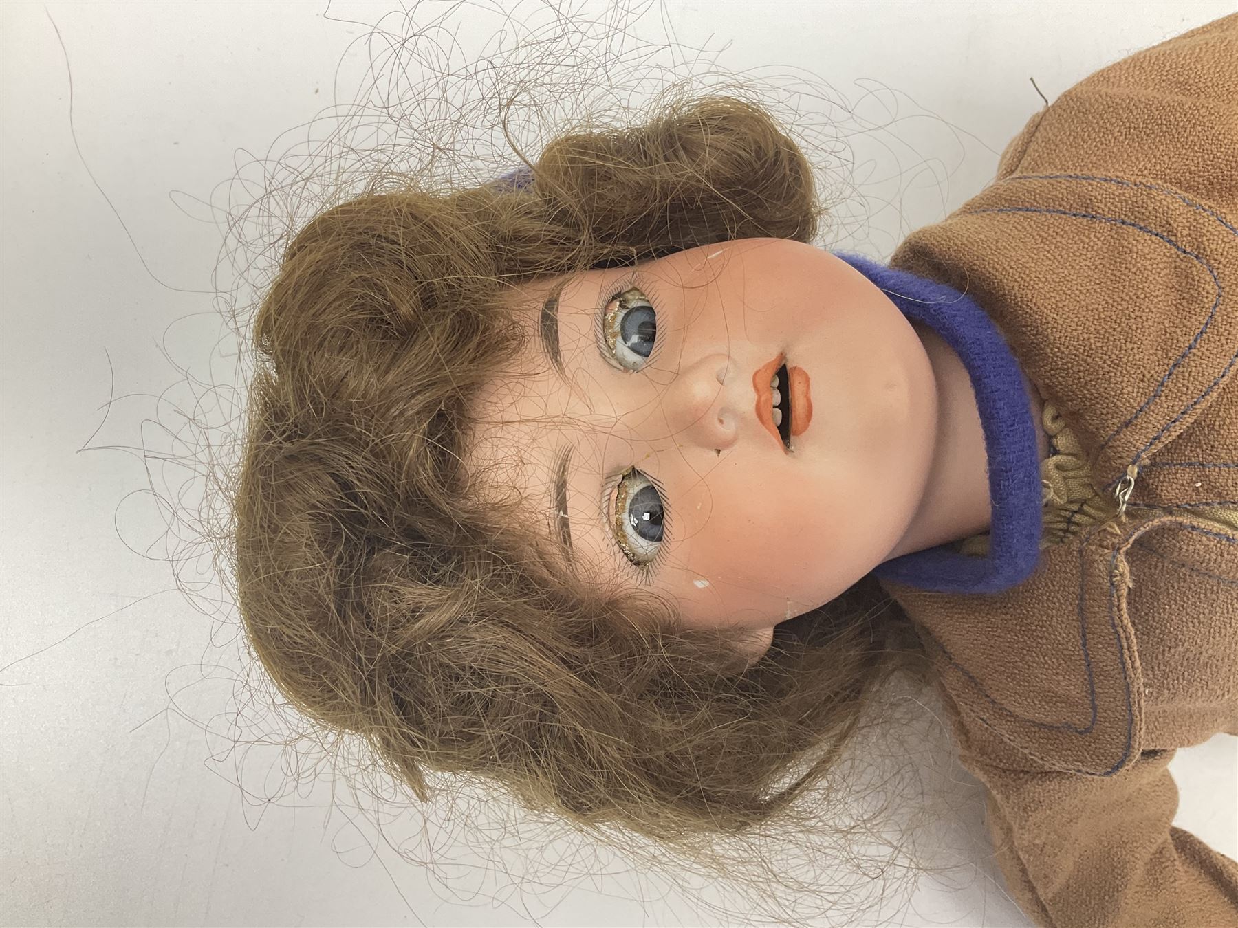 Catterfelder Puppenfabrik Germany bisque head baby doll with moulded hair, sleeping eyes, open mouth with teeth and trembly tongue, and composition body with jointed limbs; marked 'C.P. 208/50 V S' H50cm; together with an Armand Marseille bisque head doll with applied hair, sleeping eyes, open mouth with teeth and composition body with jointed limbs; marked 'Made in Germany Armand Marseille 390n D.R.G.M. 246/1 A. 6 M.' H56cm (2)