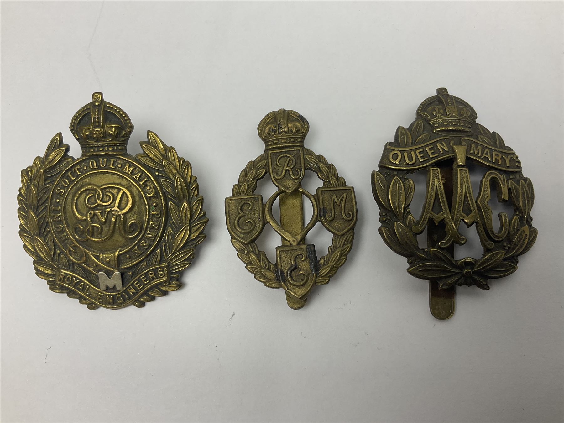 Twenty-seven military metal cap badges including Royal tank Corps, Reconnaissance Corps, Royal Armoured Corps, Royal Corps of Signals, Womens Army Auxiliary Corps, Queen Mary's Army Auxiliary Corps, Auxiliary Territorial Service,  Royal Engineers, REME, Army physical Training Corps etc 