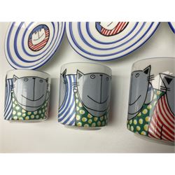 Modern studio pottery by Josie Firmin, to include cup and saucer, three espresso cups and saucers, pair of egg cups etc, each hand painted with varying cartoon cat designs